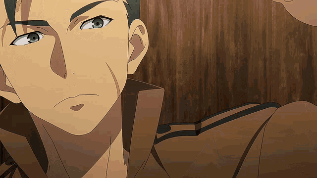 a close up of a man with green eyes and a brown jacket