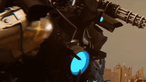 a close up of a robot with a blue light on the side