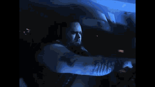 a man with a tattoo on his arm that says billy on it