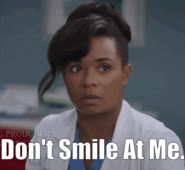 a woman in a lab coat says don 't smile at me