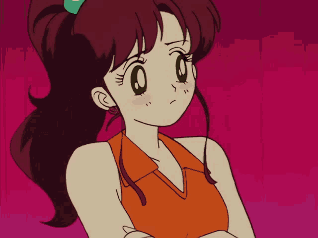 a girl with a ponytail is wearing an orange top