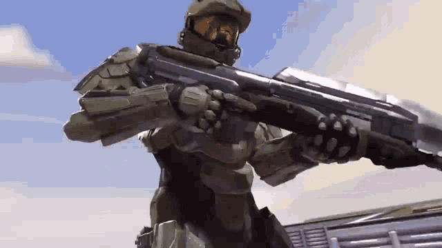 a video game character is holding a large rifle