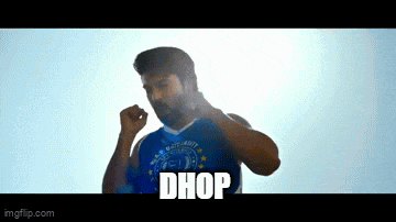 a man is wearing a blue shirt that says dhop on it