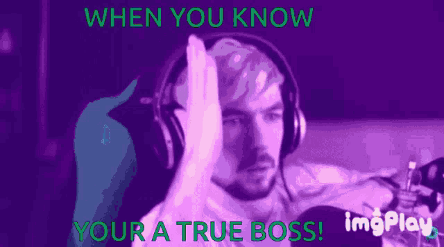a man wearing headphones with the words " when you know your a true boss " on the bottom