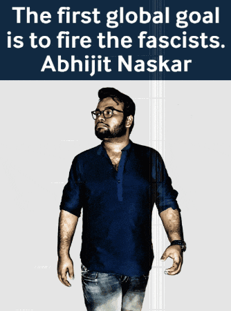 a man in a blue shirt stands in front of a sign that says the first global goal is to fire the fascists abhijit naskar