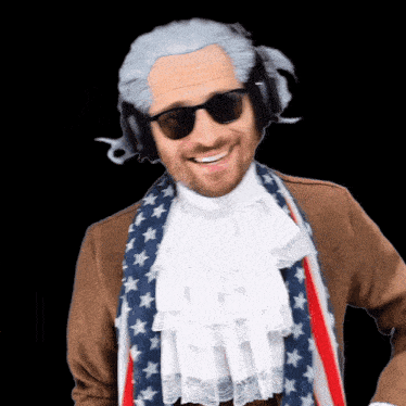 a man wearing a wig and sunglasses is wearing an american flag scarf around his neck