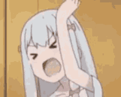 a cartoon girl with white hair is making a funny face while holding her fist up in the air .