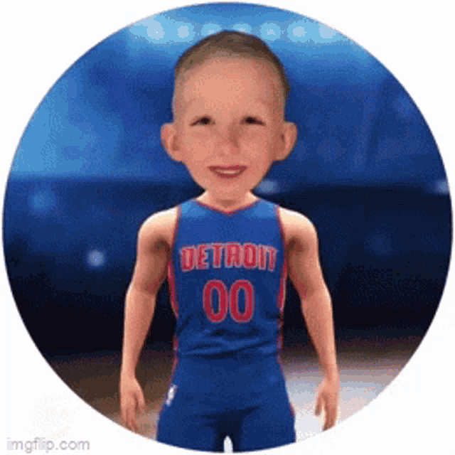 a young boy wearing a detroit jersey number 00