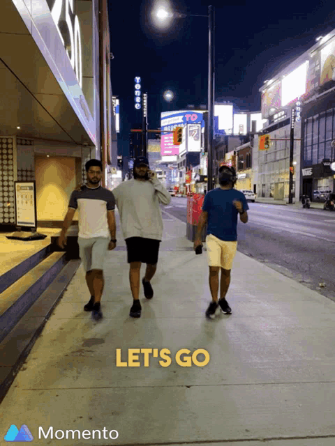 three men walking down a sidewalk with the words let 's go on the bottom right