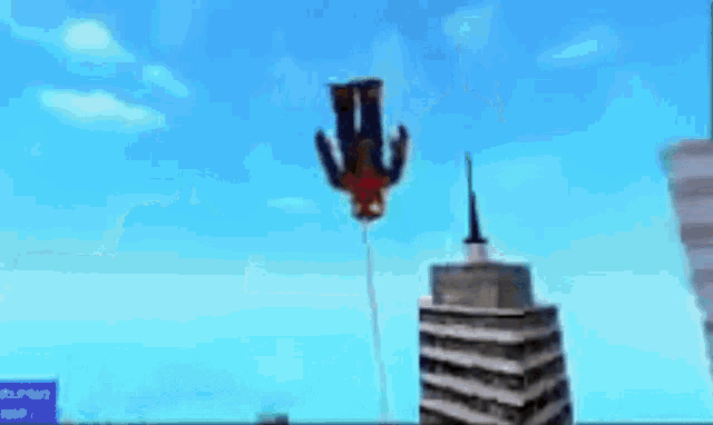 a cartoon character is flying through the air in front of a city