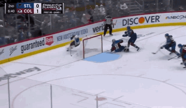 a hockey game is being played between the stl and col team