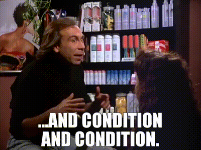 a man talking to a woman in front of a shelf of hair products with the words and condition and condition