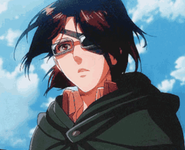 a close up of a person wearing glasses and a hood