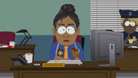 a cartoon of a woman sitting at a desk with a computer