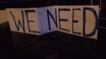 a sign that says weed on it in blue