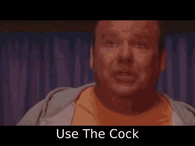 a close up of a man 's face with the words use the cock below him