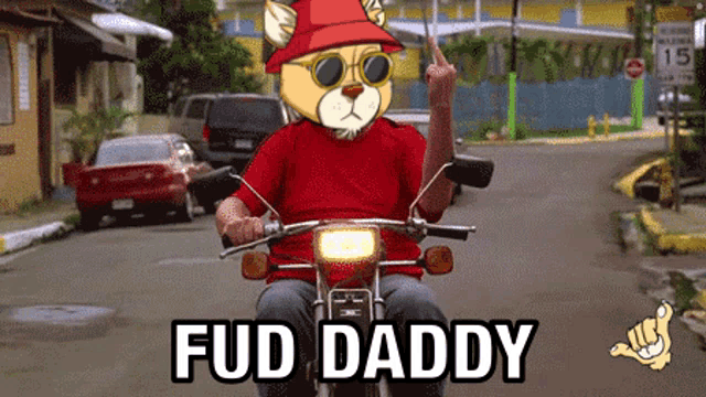 a man is riding a motorcycle with fud daddy written on the side