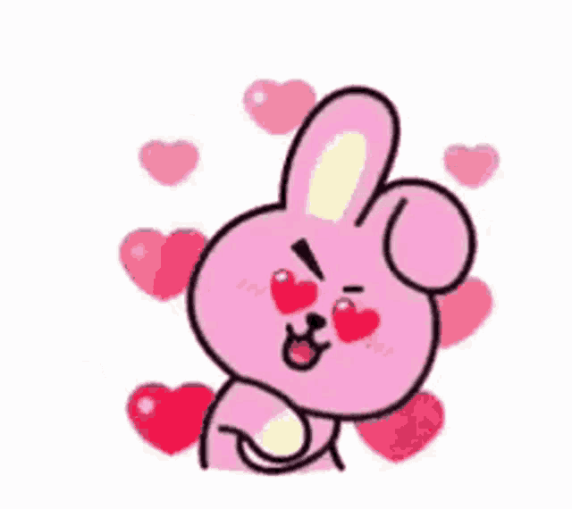 a pink bunny rabbit with hearts in its eyes is surrounded by hearts .