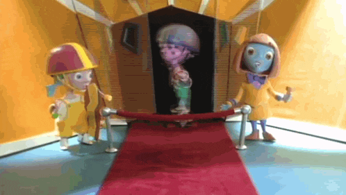 three cartoon characters are standing in front of a red carpet with a statue in the background