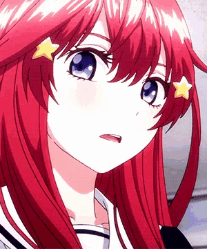 a girl with red hair and blue eyes has a star on her head