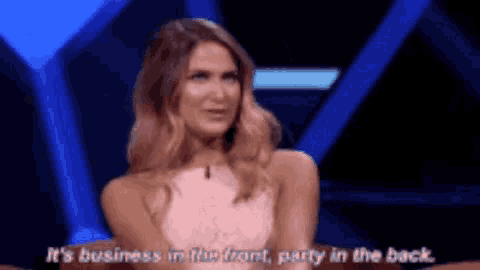 a woman in a white dress says it 's business in the front party in the back ..