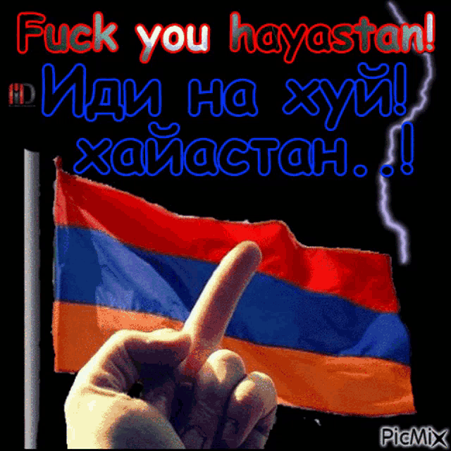 a hand giving the middle finger in front of a flag that says fuck you hayatan