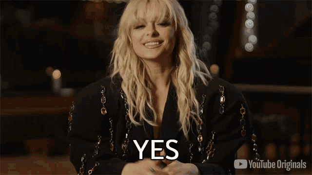a woman in a black jacket says yes in a youtube originals ad