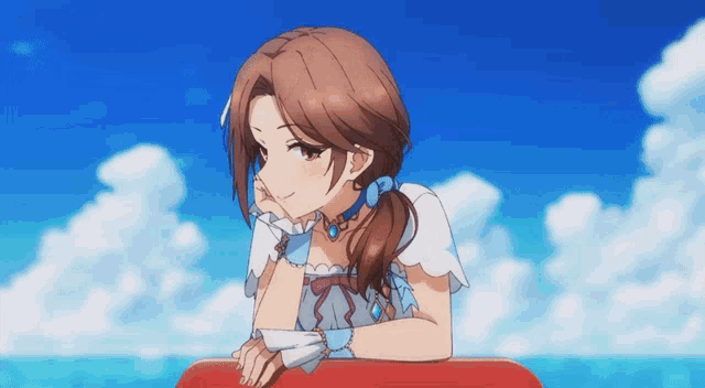 a girl leaning on a red float in the ocean