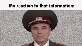 a man in a military uniform is wearing a hat and making a face .