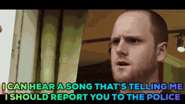 a man is talking about a song that is telling him he should report you to the police