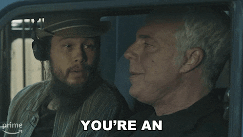 two men in a car with the words insufferable asshole on the screen