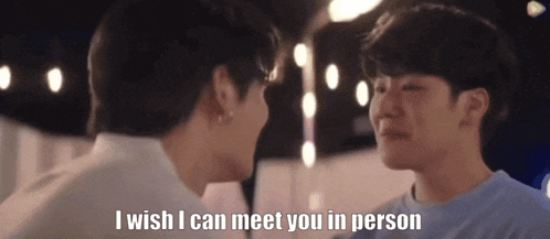 two young men are looking at each other and one of them is saying `` i wish i can meet you in person ''