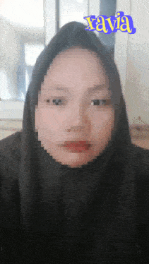 a pixelated image of a woman wearing a black hijab with the name xavia written above her