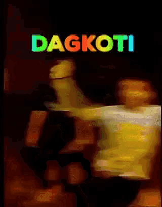 a man is dancing in front of the word dagkoti