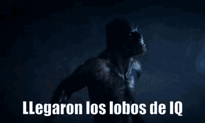 a werewolf is standing in the dark with the words llegaron los lobos de iq written below it .