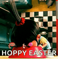 a girl with a ponytail is sitting in a red bowl with candy in her hair .