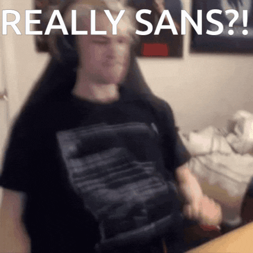a man wearing headphones says " really sans " in front of his face