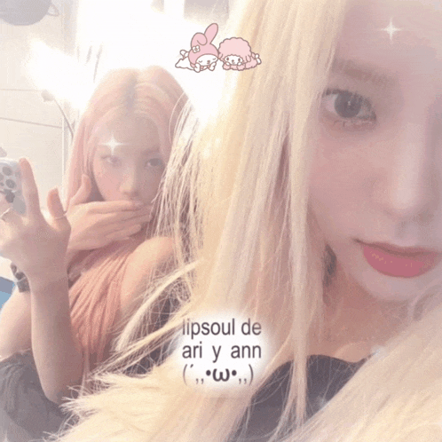 two girls are taking a selfie with the words lipsoul de ari y ann
