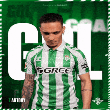 a man in a green and white striped shirt with gree on the front