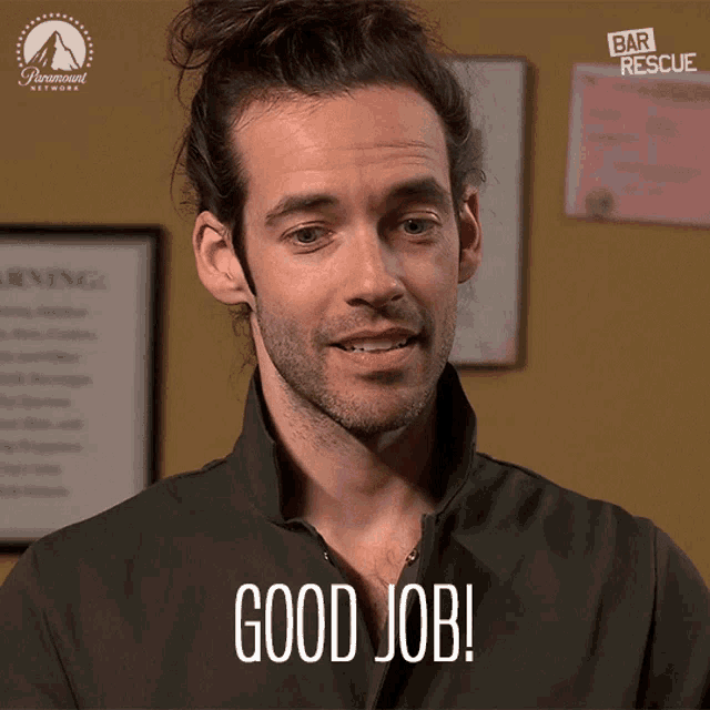a man with a bun says good job