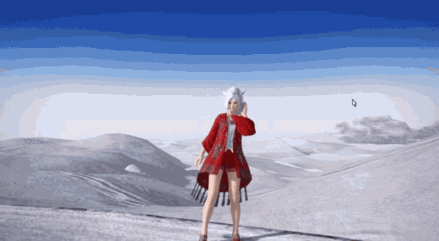 a woman in a red dress stands on a snowy hill