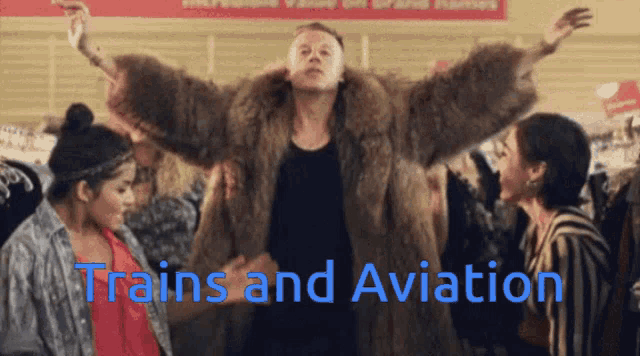 a man in a fur coat with the words trains and aviation written below him