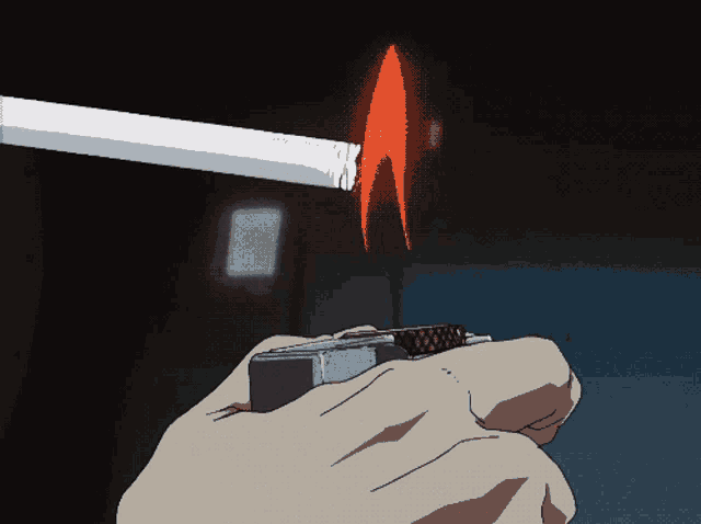 a person lighting a cigarette with a lighter in their hand