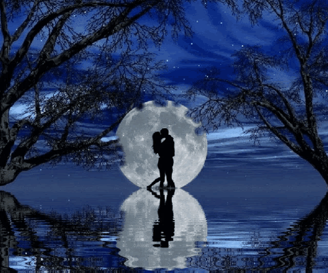 a couple kissing in front of the full moon