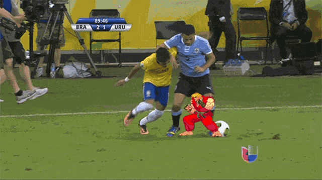 a soccer game is being played between bra and uru and the score is 21 to 21