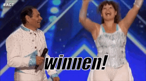 a man and a woman are standing on a stage with the word winnen in the corner