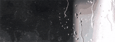 a close up of water drops on a window glass