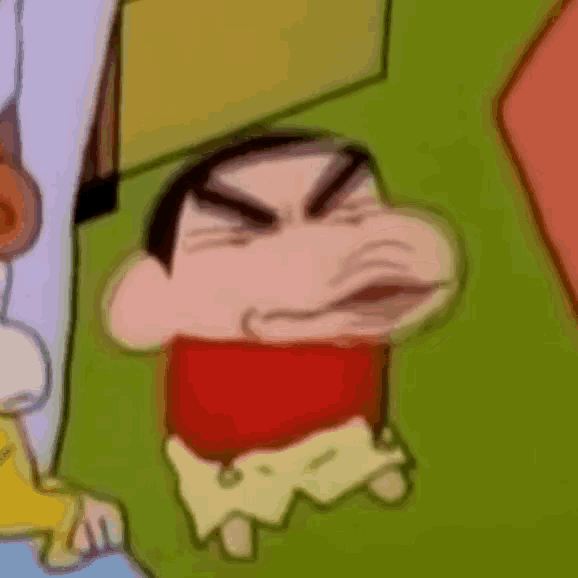 a close up of a cartoon character with a very angry face .