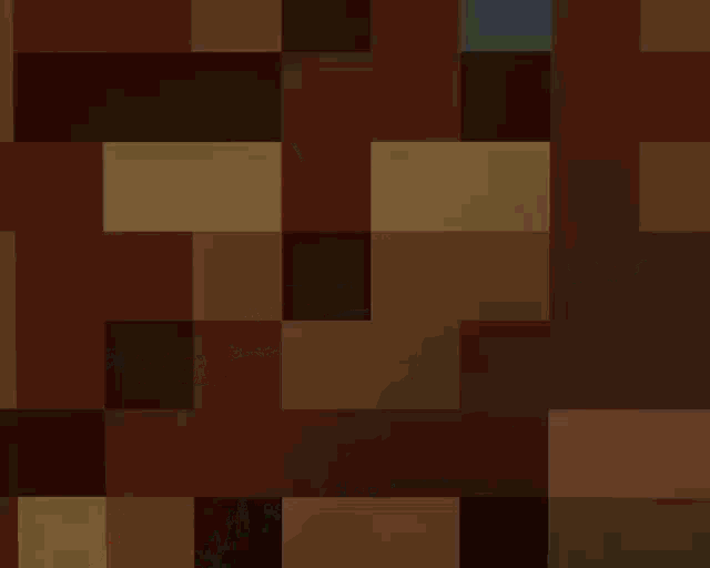 a screenshot of a video game called minecraft with a mountain in the background .