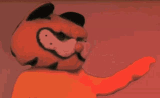 a garfield mascot with a green background